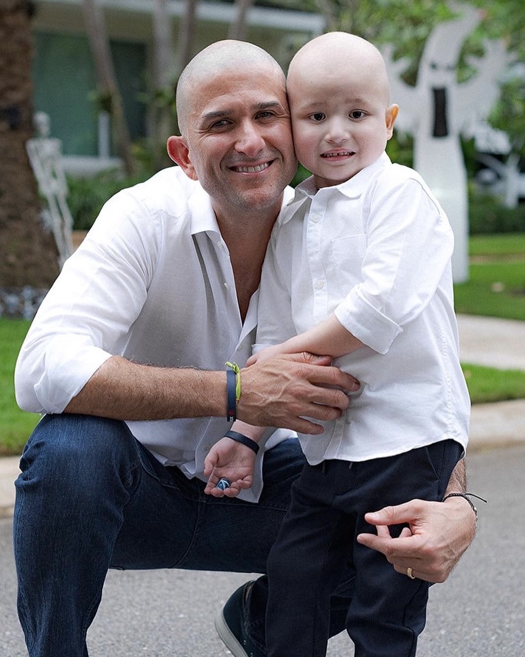 Max and his father smiling together