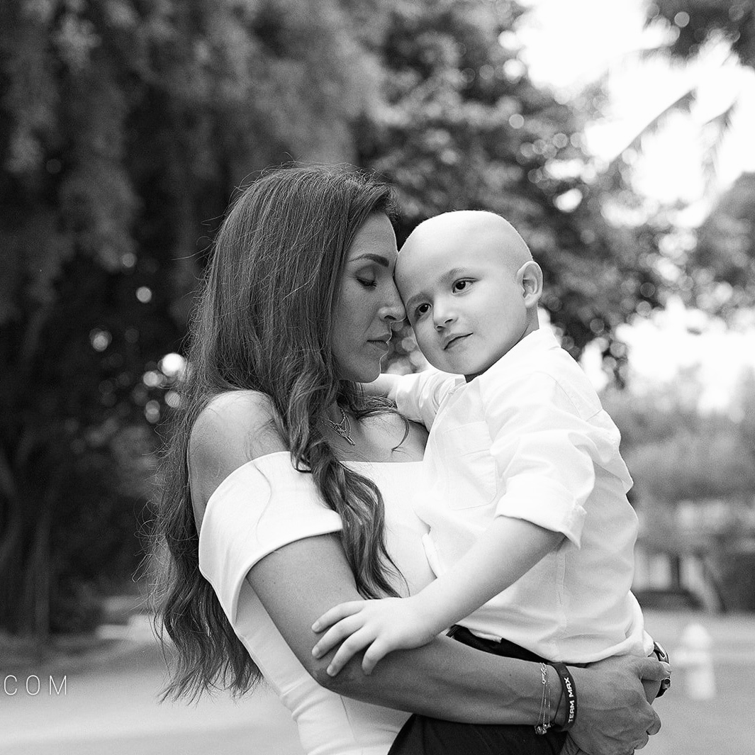 Family embracing Max during treatment